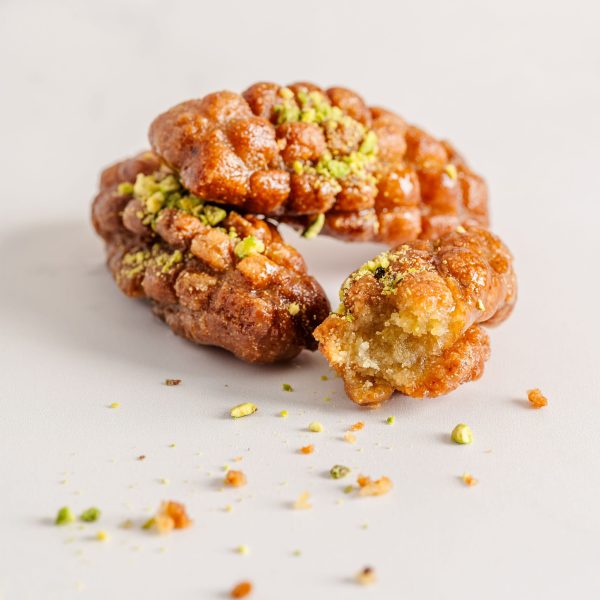Maarcoon – Classic Lebanese fried semolina dough dessert dipped in syrup, crafted to order from our bakery in Sterling, Virginia