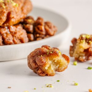 Maarcoon – Classic Lebanese fried semolina dough dessert dipped in syrup, crafted to order from our bakery in Sterling, Virginia